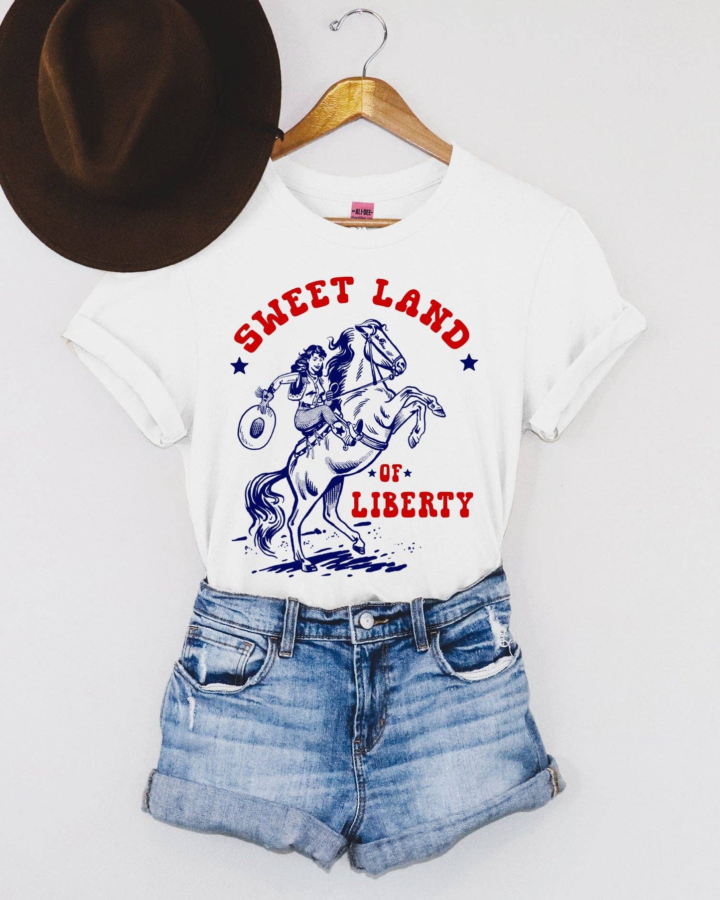 Ali Dee Women's T-Shirt - Sweet Land of Liberty Western Graphic Tee - White